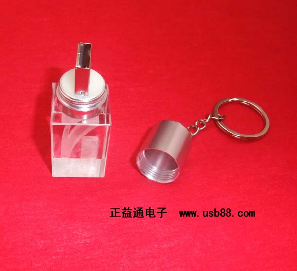 透明LED燈U盤系列水晶發(fā)光U盤,該款長方體水晶U盤采用純 可激光內(nèi)雕立體LOGO,動感十足的LOGO定制